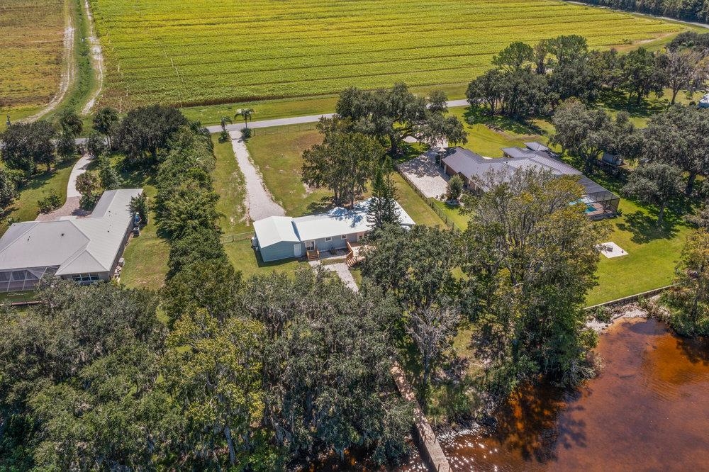 137 Mays Cove Road East Palatka, FL 32131 - Photo 61 of 70 a view of a house with a lake view