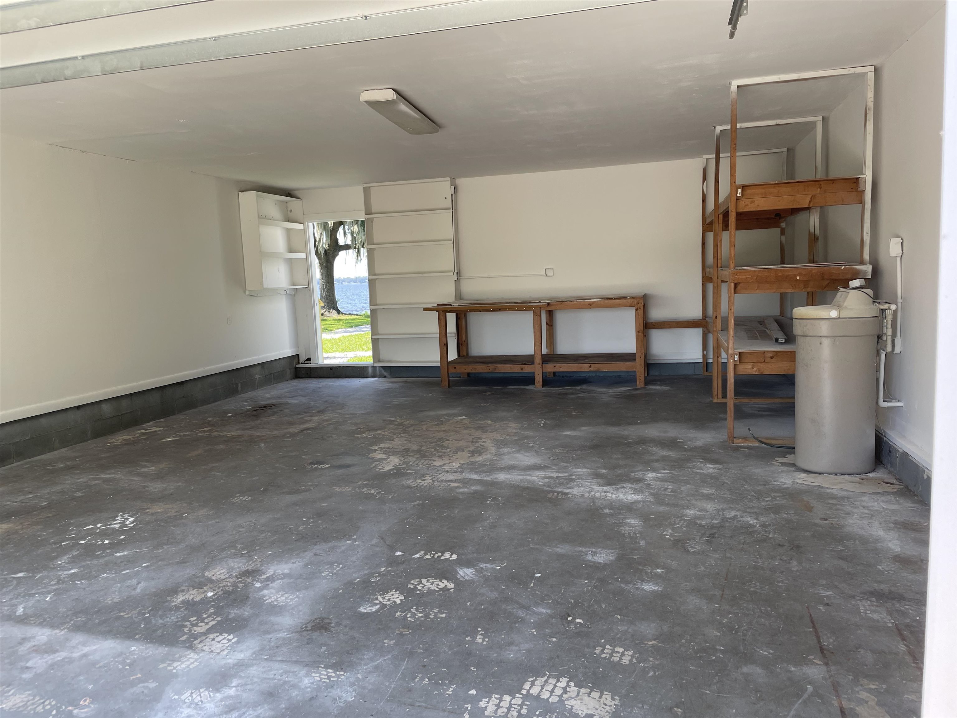 137 Mays Cove Road East Palatka, FL 32131 - Photo 69 of 70 a view of an empty room with window and fireplace