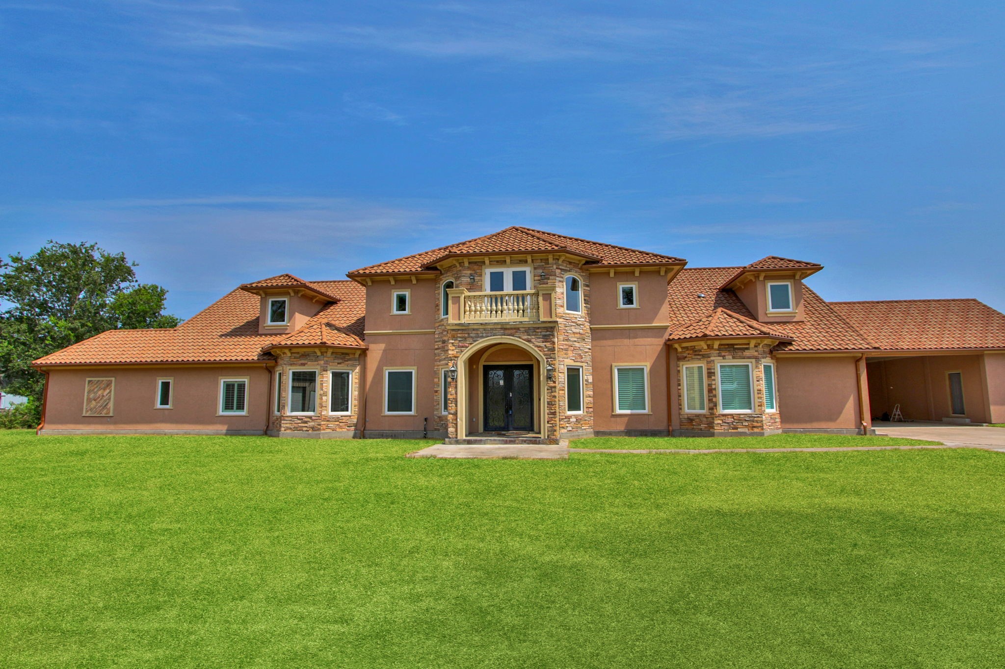 17018 Grant Road Cypress, TX 77429 - Photo 1 of 50 a front view of a house with a garden