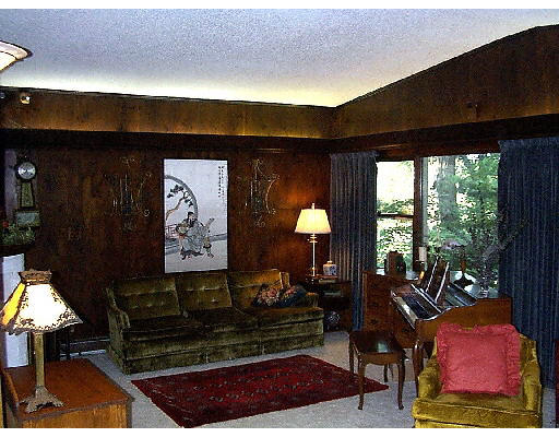 417 Forest Hills Road Springfield, MA 01128 - Photo 3 of 6 a living room with furniture and a floor to ceiling window