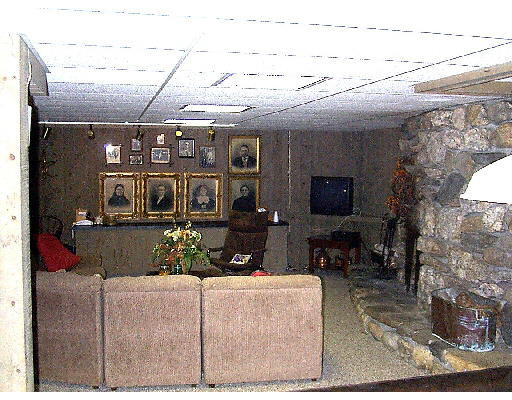 417 Forest Hills Road Springfield, MA 01128 - Photo 6 of 6 a living room with furniture and a chandelier