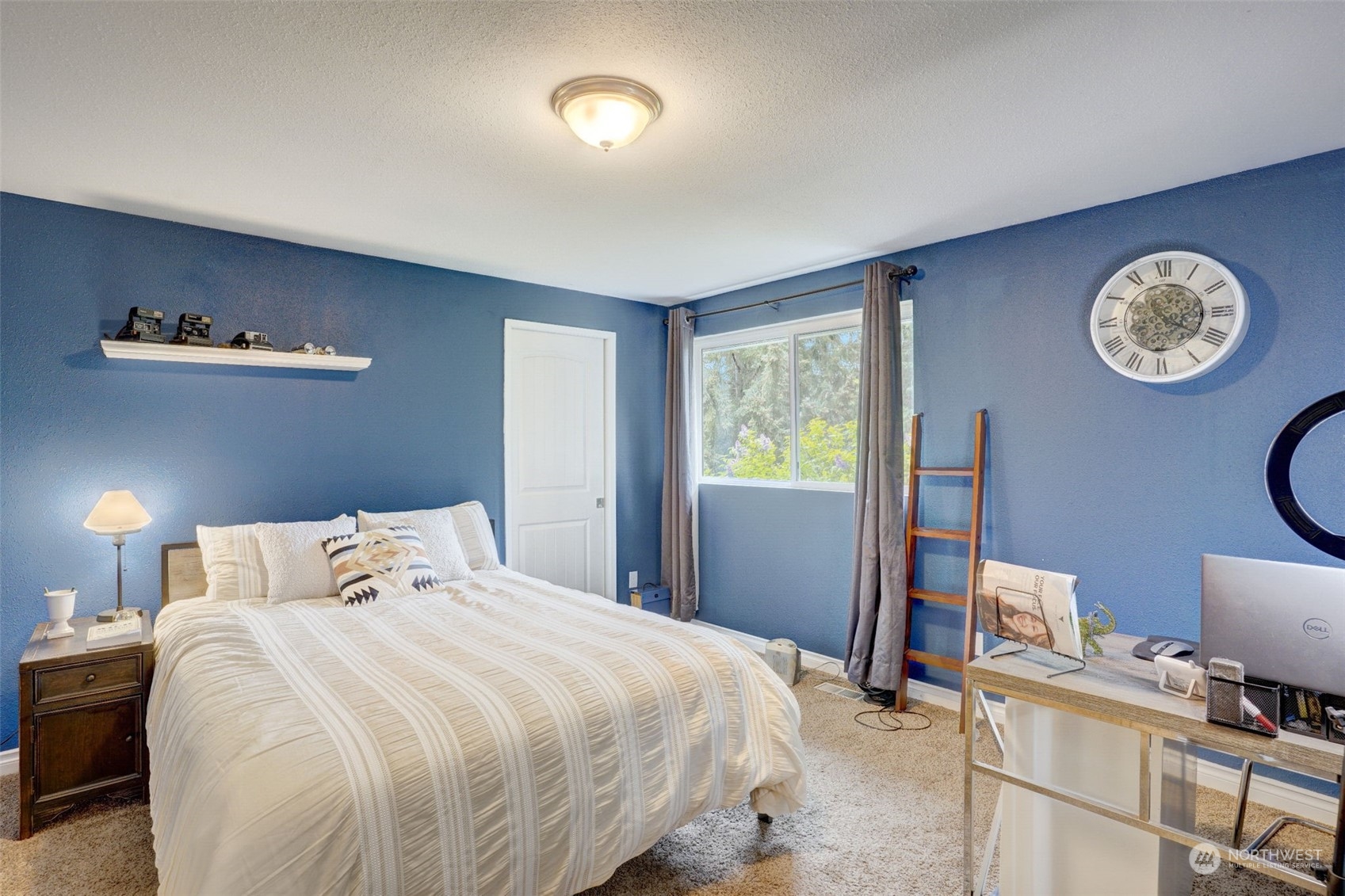 968 Brookdale Road East Tacoma, WA 98445 - Photo 14 of 31 a bedroom with a bed and a table with chair