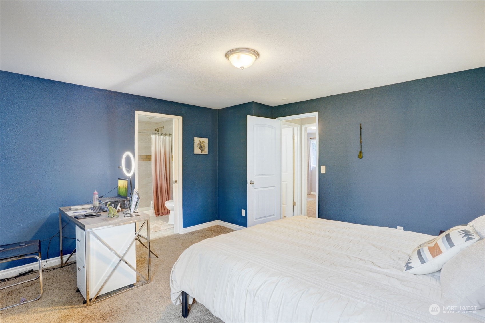 968 Brookdale Road East Tacoma, WA 98445 - Photo 15 of 31 a bedroom with a bed and a table in it