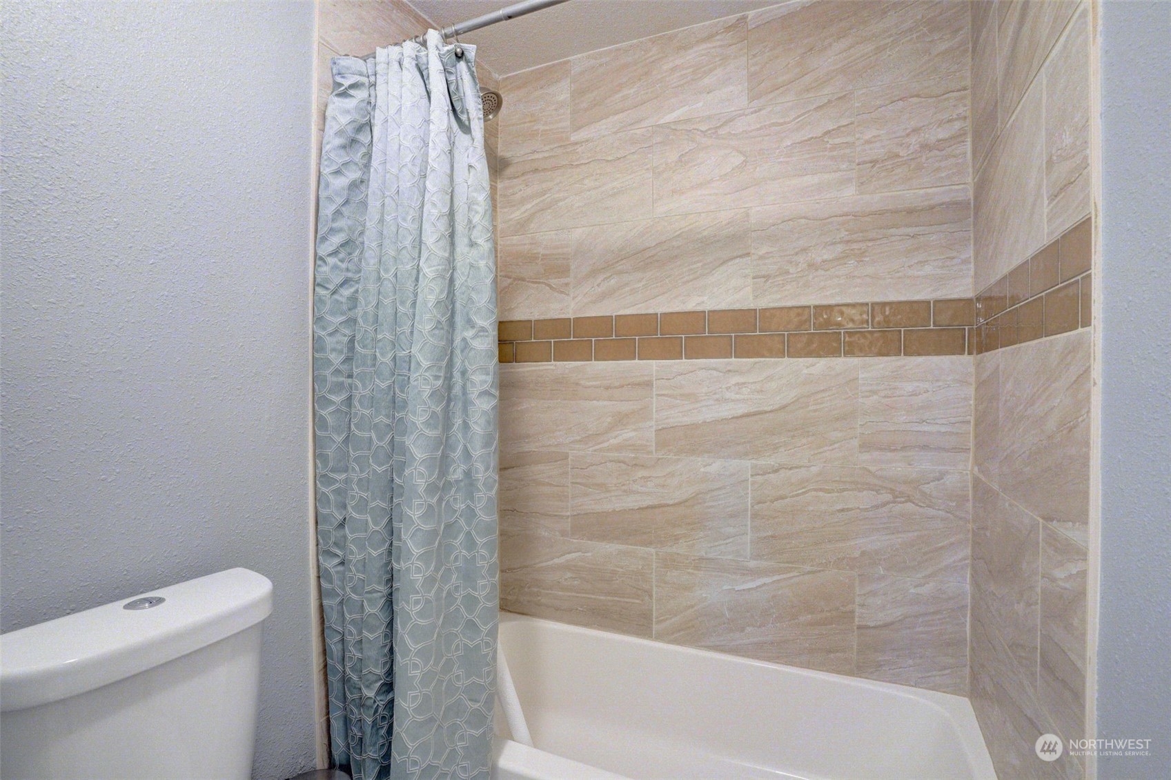 968 Brookdale Road East Tacoma, WA 98445 - Photo 17 of 31 a bathroom with a shower and a toilet