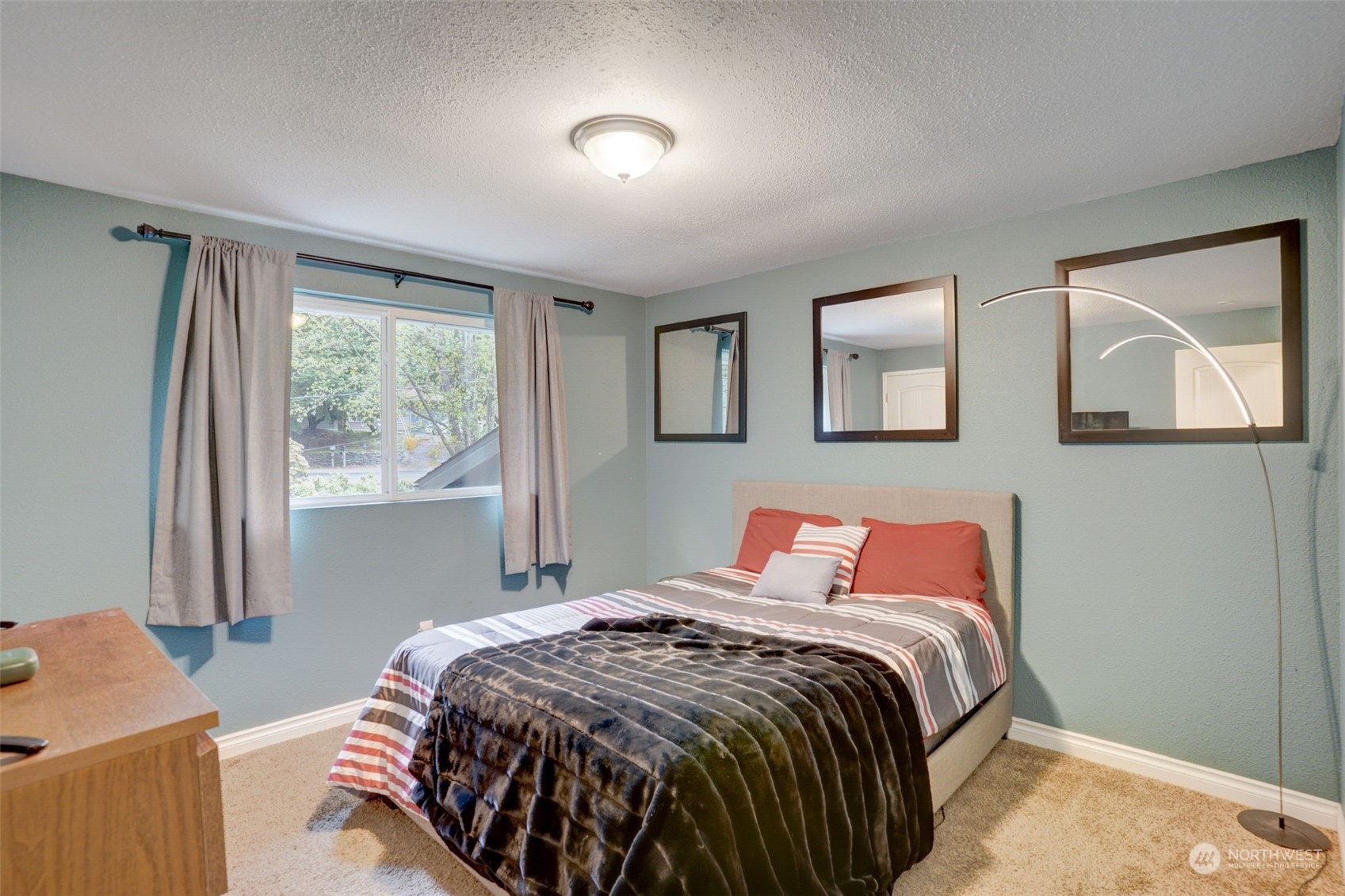 968 Brookdale Road East Tacoma, WA 98445 - Photo 19 of 31 a bedroom with a bed and a window