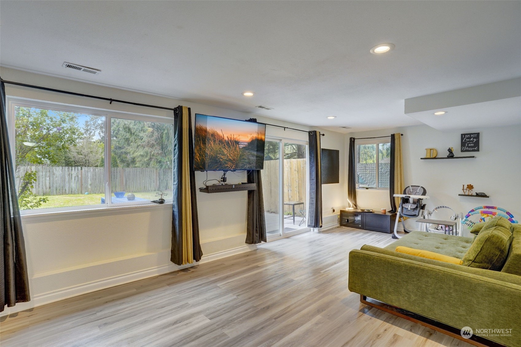 968 Brookdale Road East Tacoma, WA 98445 - Photo 21 of 31 a living room with furniture and large windows