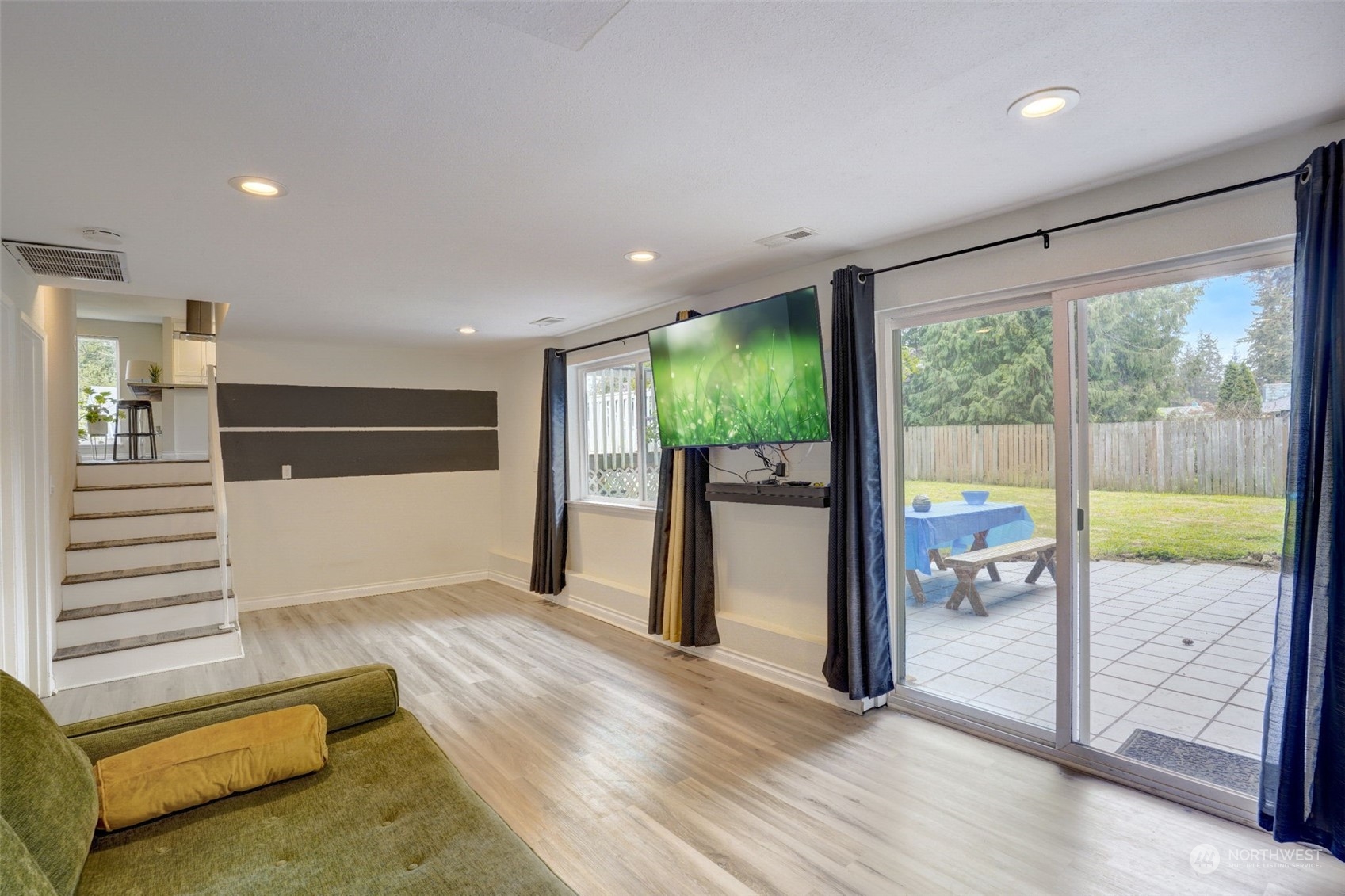 968 Brookdale Road East Tacoma, WA 98445 - Photo 22 of 31 a view of hallway with stairs and wooden floor