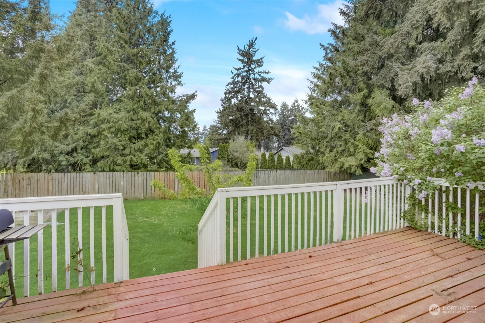 968 Brookdale Road East Tacoma, WA 98445 - Photo 29 of 31 a view of deck with wooden floor and fence