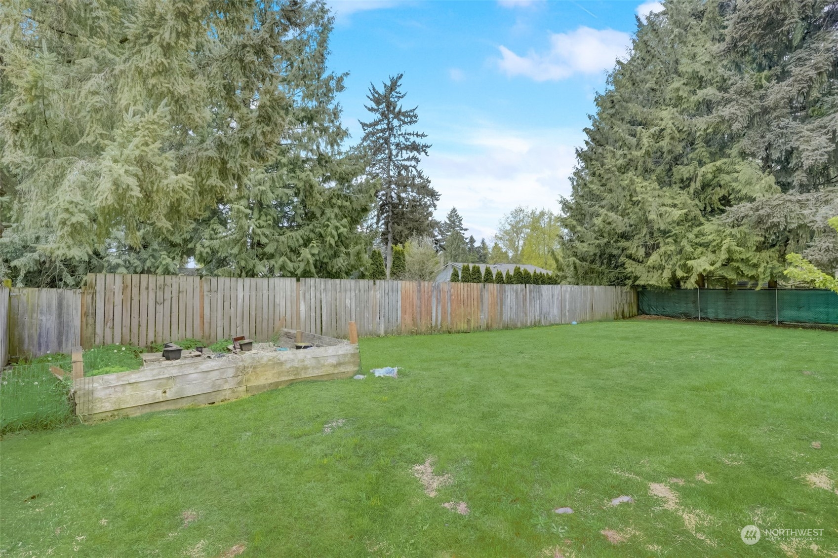 968 Brookdale Road East Tacoma, WA 98445 - Photo 30 of 31 a garden view with a seating space