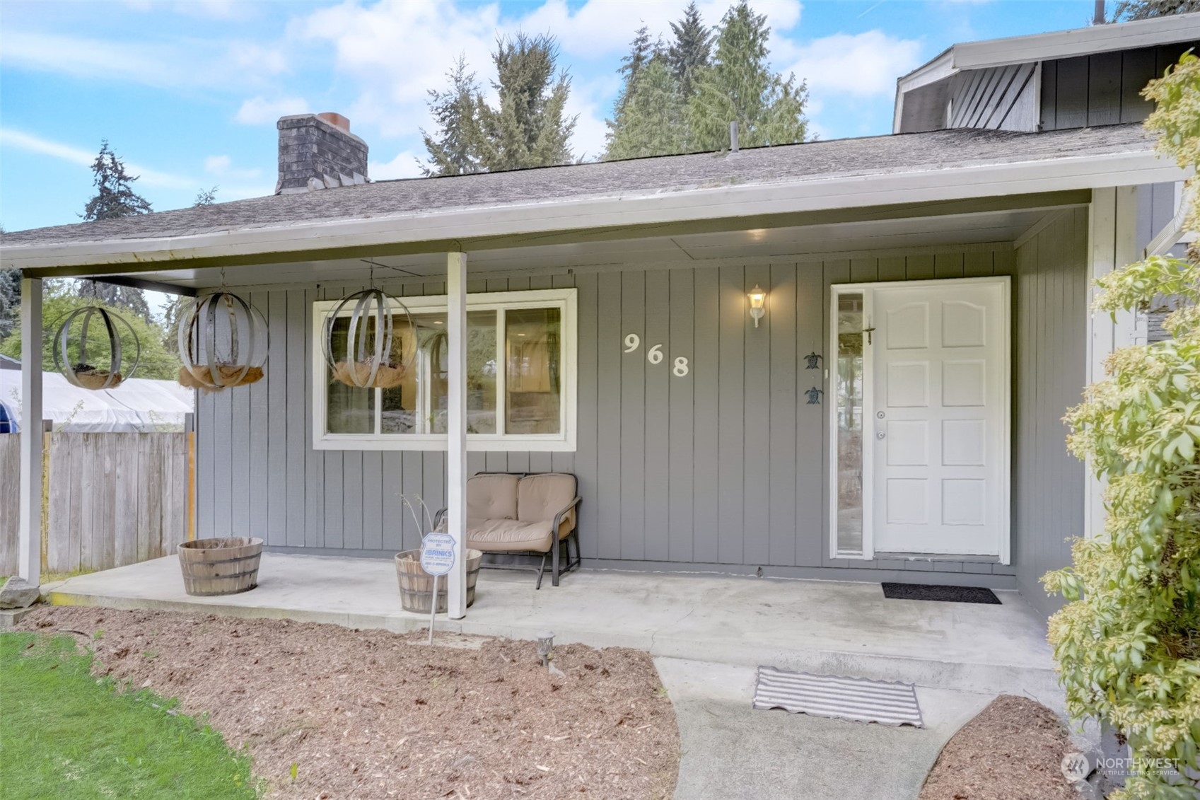 968 Brookdale Road East Tacoma, WA 98445 - Photo 3 of 31 a view of a house with backyard and sitting area