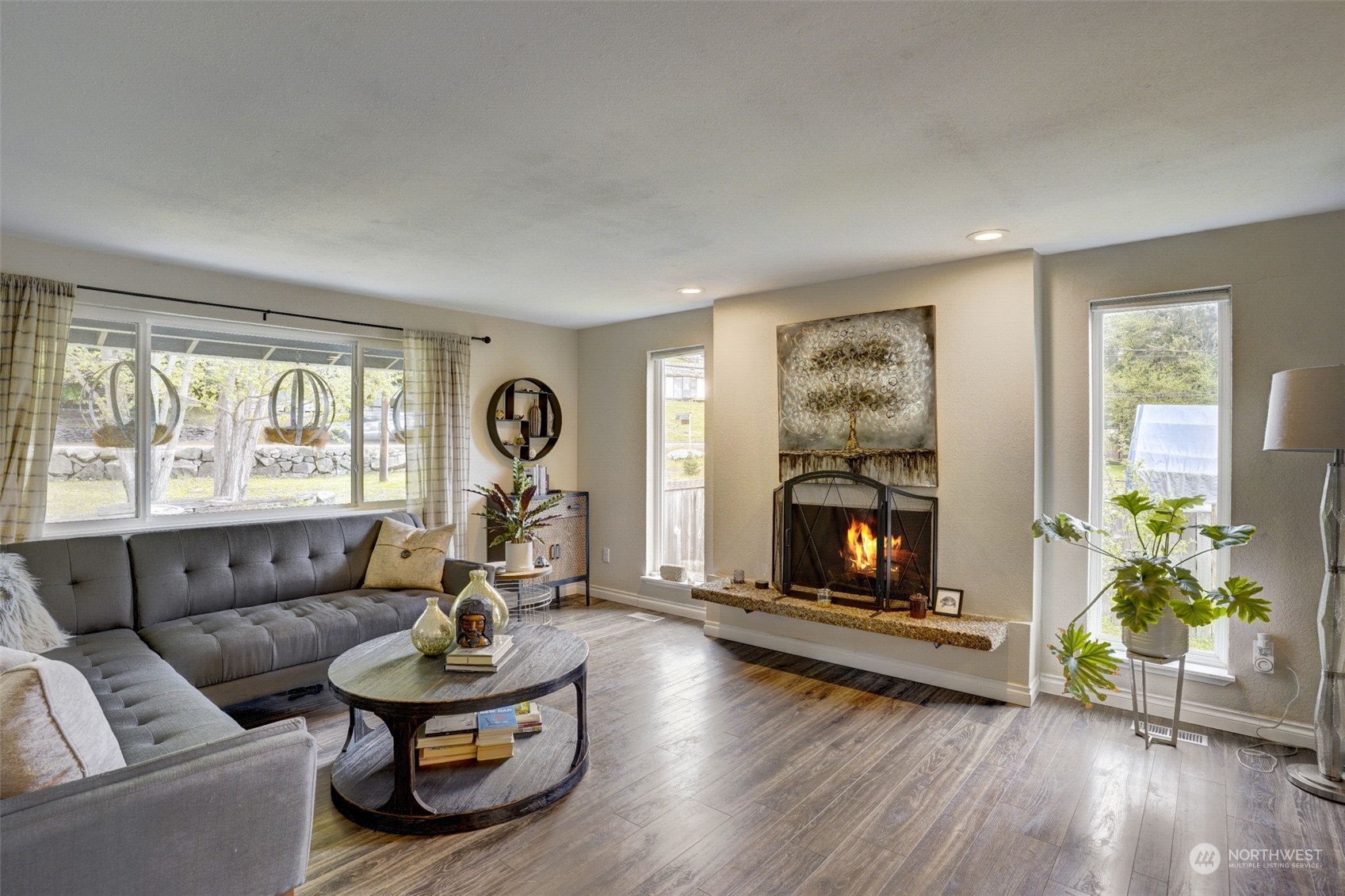 968 Brookdale Road East Tacoma, WA 98445 - Photo 5 of 31 a living room with furniture fireplace and window