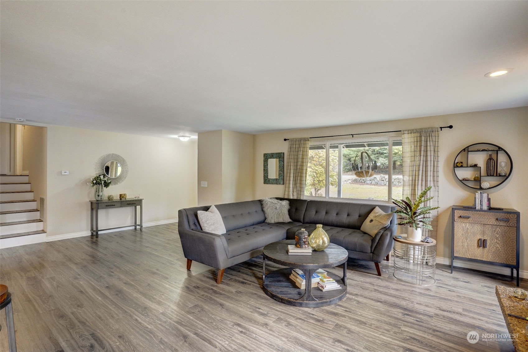 968 Brookdale Road East Tacoma, WA 98445 - Photo 6 of 31 a living room with furniture and wooden floor