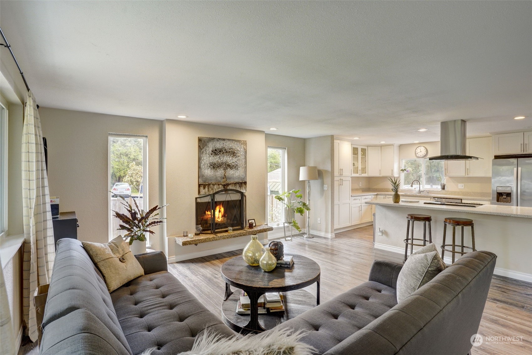 968 Brookdale Road East Tacoma, WA 98445 - Photo 7 of 31 a living room with furniture and a wooden floor