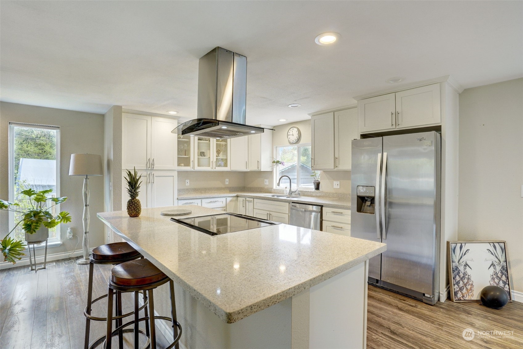 968 Brookdale Road East Tacoma, WA 98445 - Photo 10 of 31 a kitchen with stainless steel appliances granite countertop a sink and a refrigerator