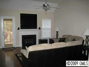 4430 Plyler Mill Road Monroe, NC 28112 - Photo 4 of 8 a bedroom with two beds and a flat screen tv