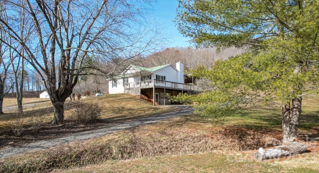 66 Fox Branch Road Fairview, NC 28730 - Photo 34 of 38 a view of a house with a yard