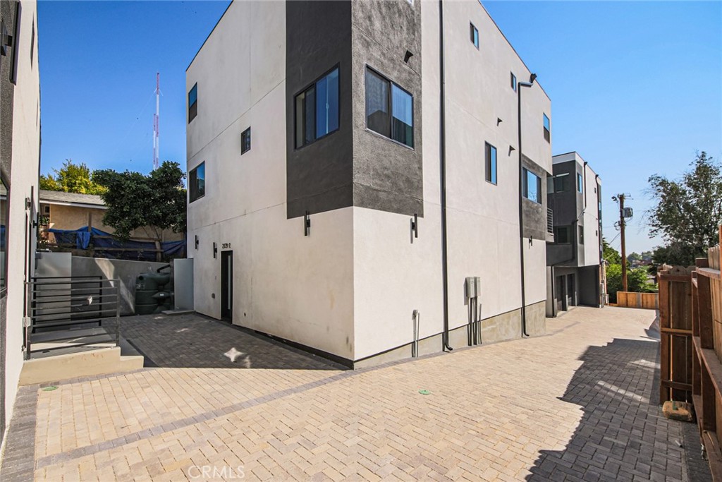 2129 Aaron Street, Unit 2 Los Angeles, CA 90026 - Photo 15 of 15 a view of a house with a small yard
