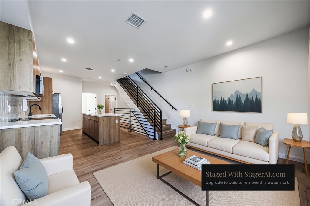 2129 Aaron Street, Unit 2 Los Angeles, CA 90026 - Photo 2 of 15 a living room with furniture and wooden floor
