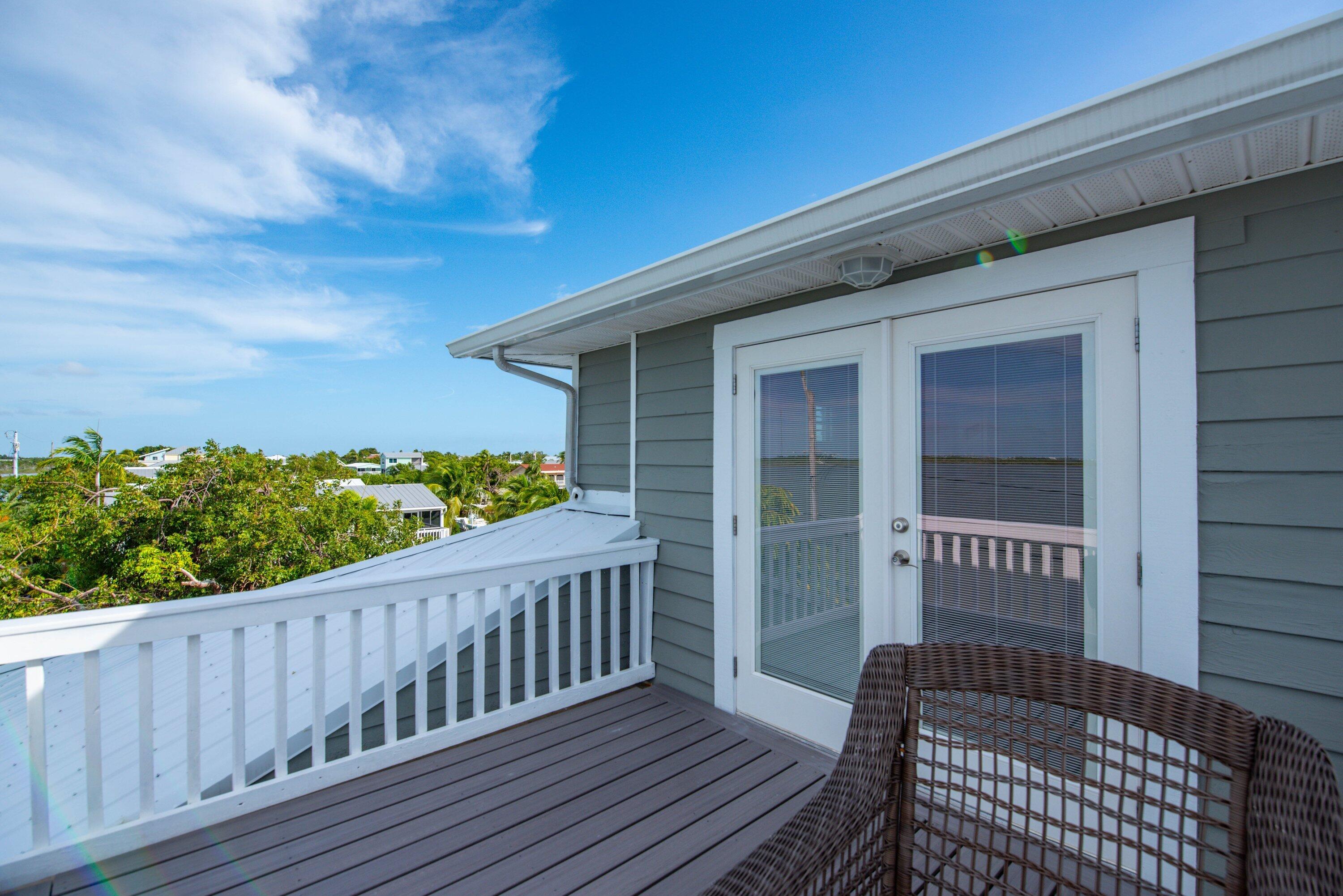 643 Indies Road Summerland Key, FL 33042 - Photo 11 of 50 a view of a wooden deck