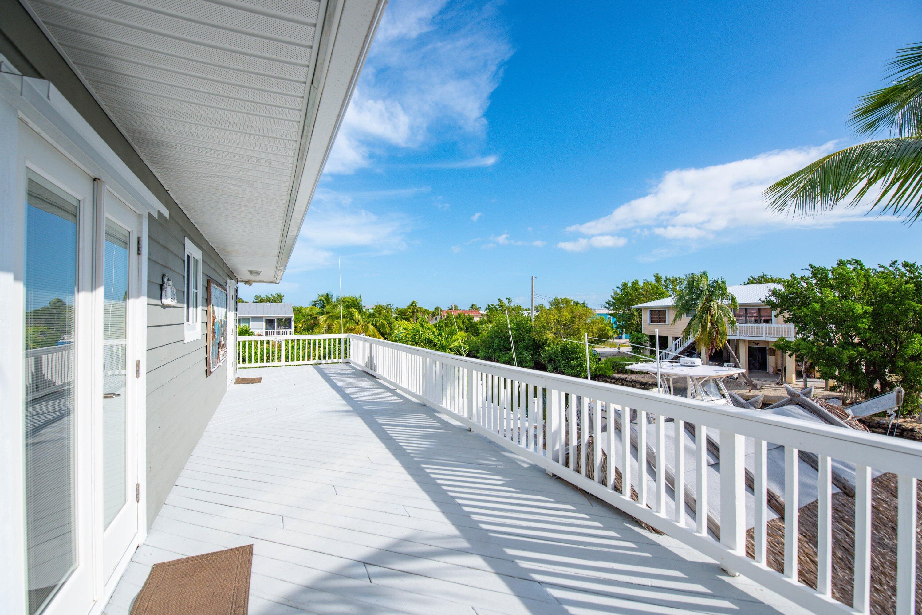 643 Indies Road Summerland Key, FL 33042 - Photo 12 of 50 a view of a balcony with city view