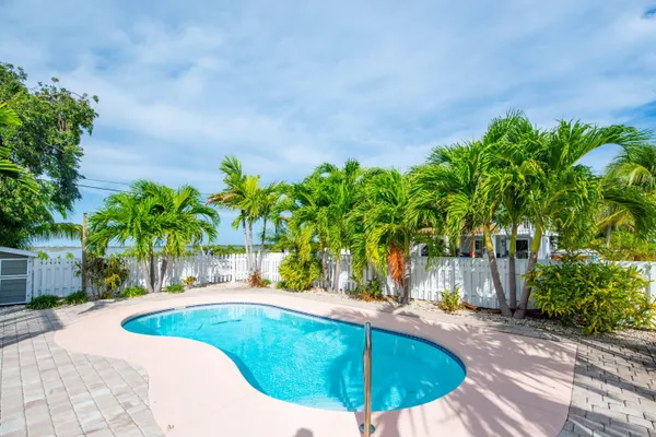 a view of a swimming pool with an outdoor space