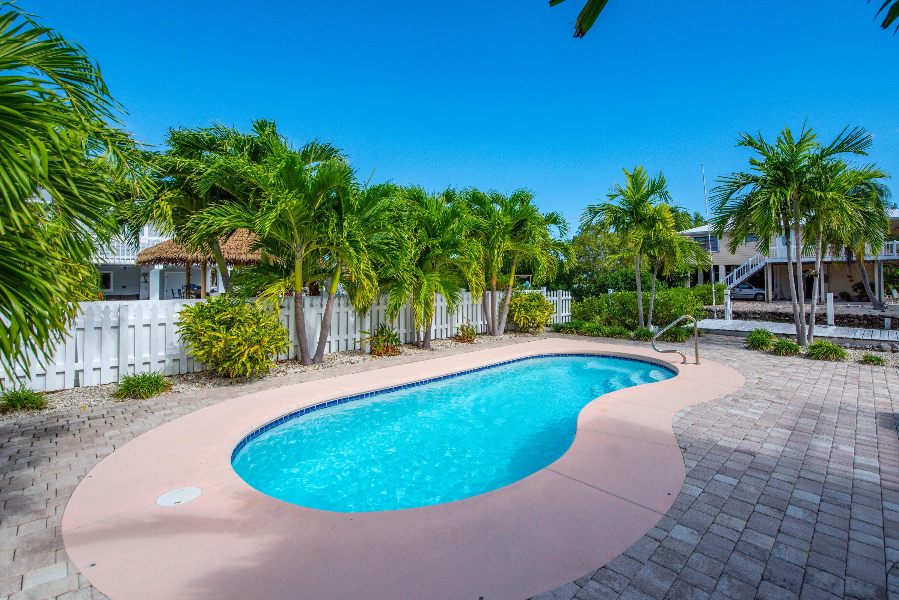 643 Indies Road Summerland Key, FL 33042 - Photo 36 of 50 a view of a swimming pool with a patio
