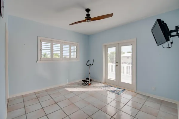 a view of a livingroom with furniture and windows