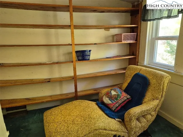 a living room with a couch and a table