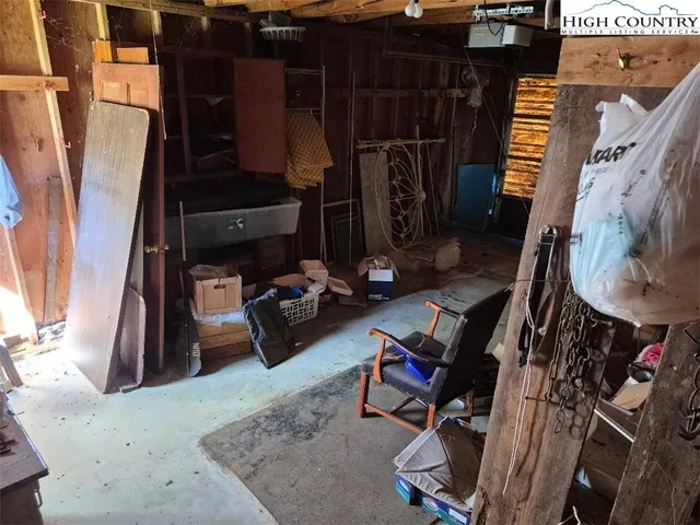 a room with gym equipment and a mirror