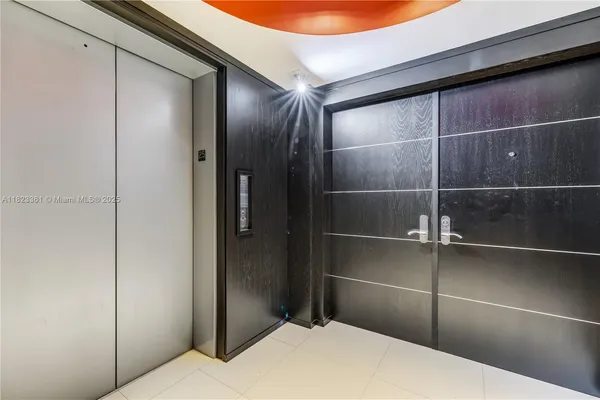 a bathroom with a shower and a mirror