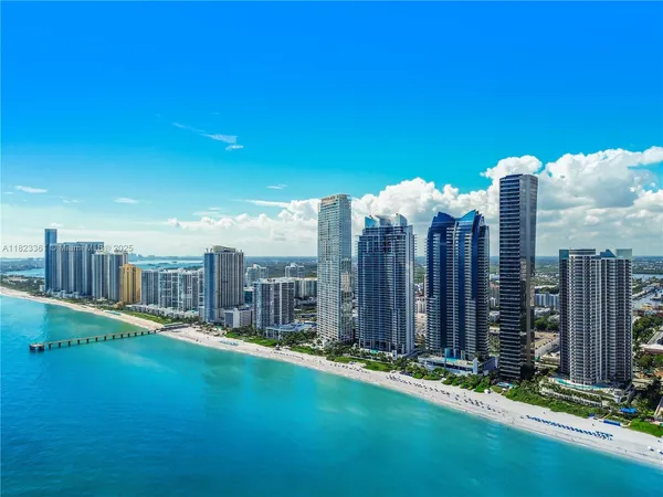 a view of a city with tall buildings