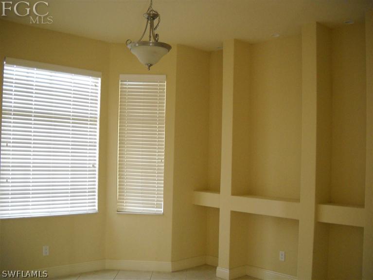 6973 Debrita Road North Port, FL 34291 - Photo 12 of 18 a view of an empty room with a window