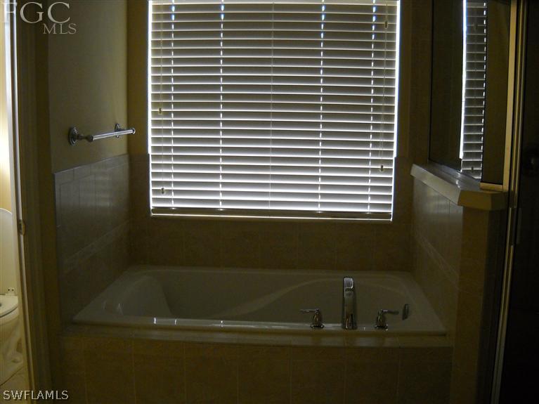 6973 Debrita Road North Port, FL 34291 - Photo 16 of 18 a bathroom with a sink