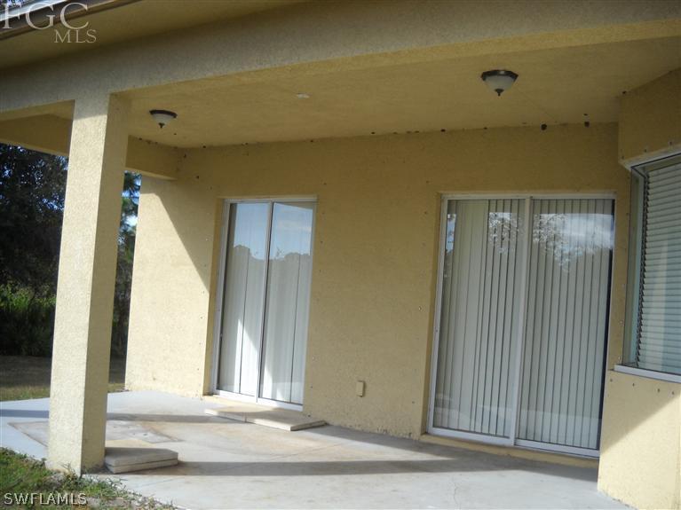6973 Debrita Road North Port, FL 34291 - Photo 4 of 18 a view of a entryway of a building