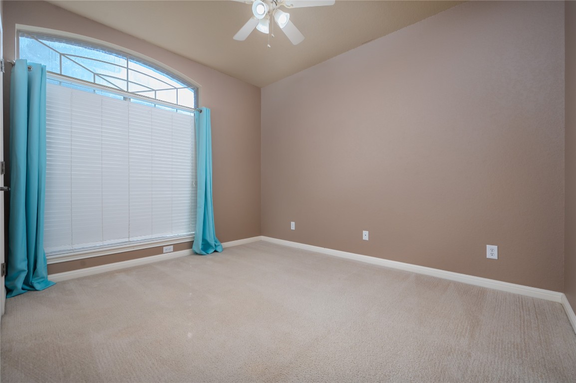 455 Rose Blossom Loop La Vernia, TX 78121 - Photo 16 of 24 a view of an empty room with a window