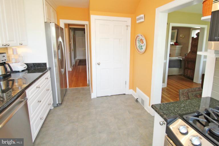 10 Springvale Lane Silver Spring, MD 20910 - Photo 14 of 27 a view of kitchen and utility room
