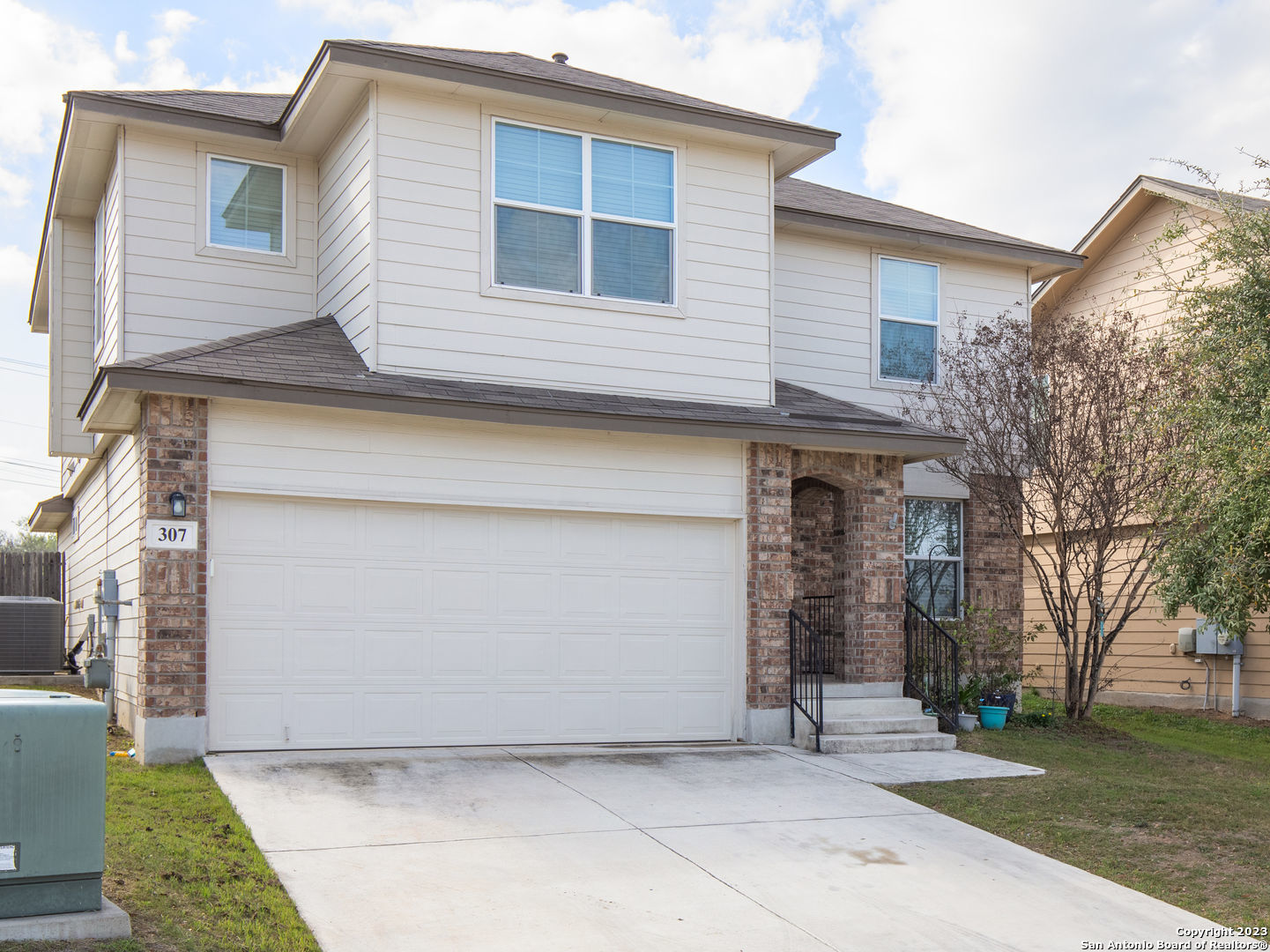 307 Kildeer Creek San Antonio, TX 78253 - Photo 1 of 26 a front view of a house with garden