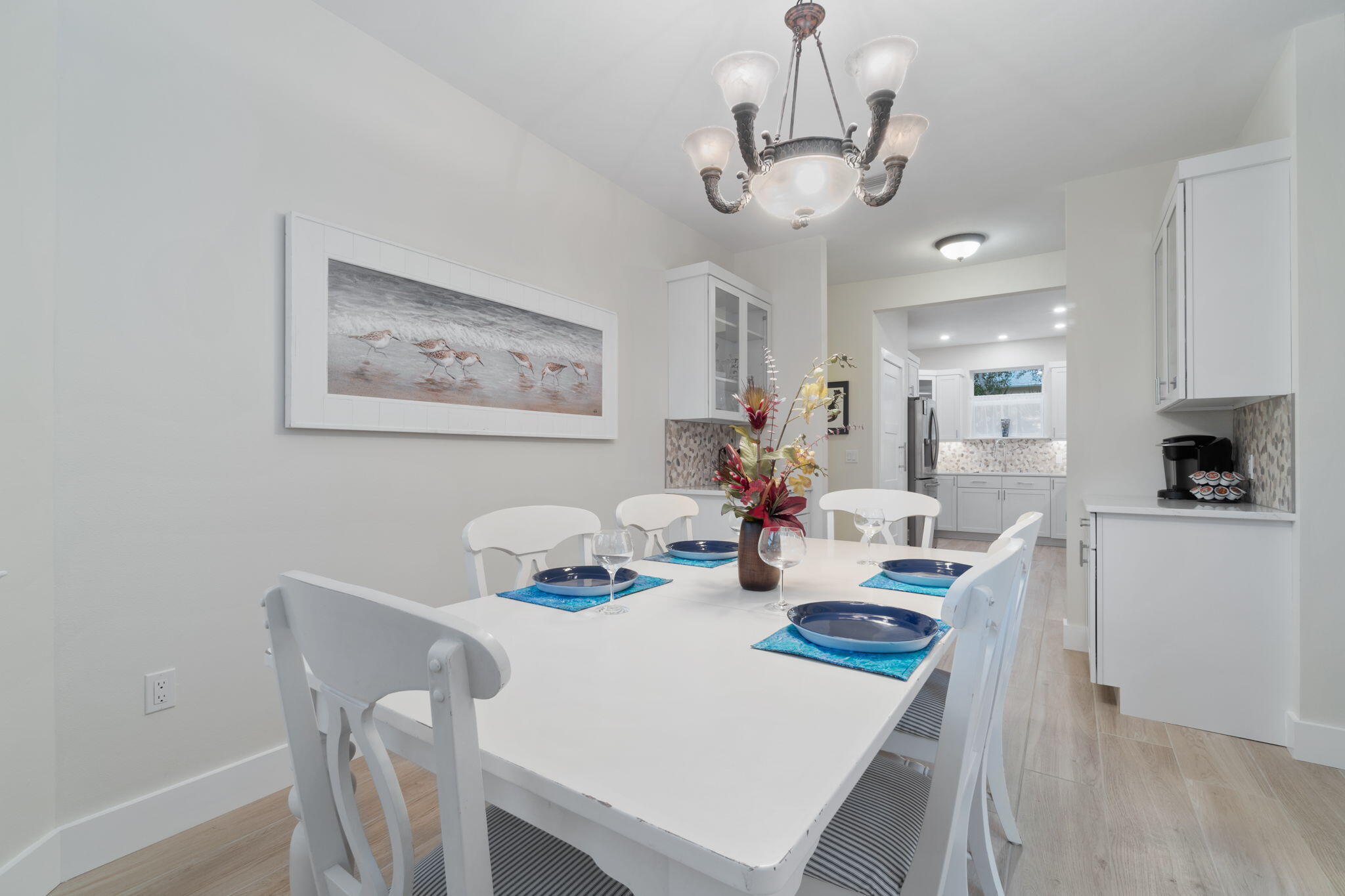 362 South Holiday Road Miramar Beach, FL 32550 - Photo 19 of 51 a view of a dining room with furniture and wooden floor