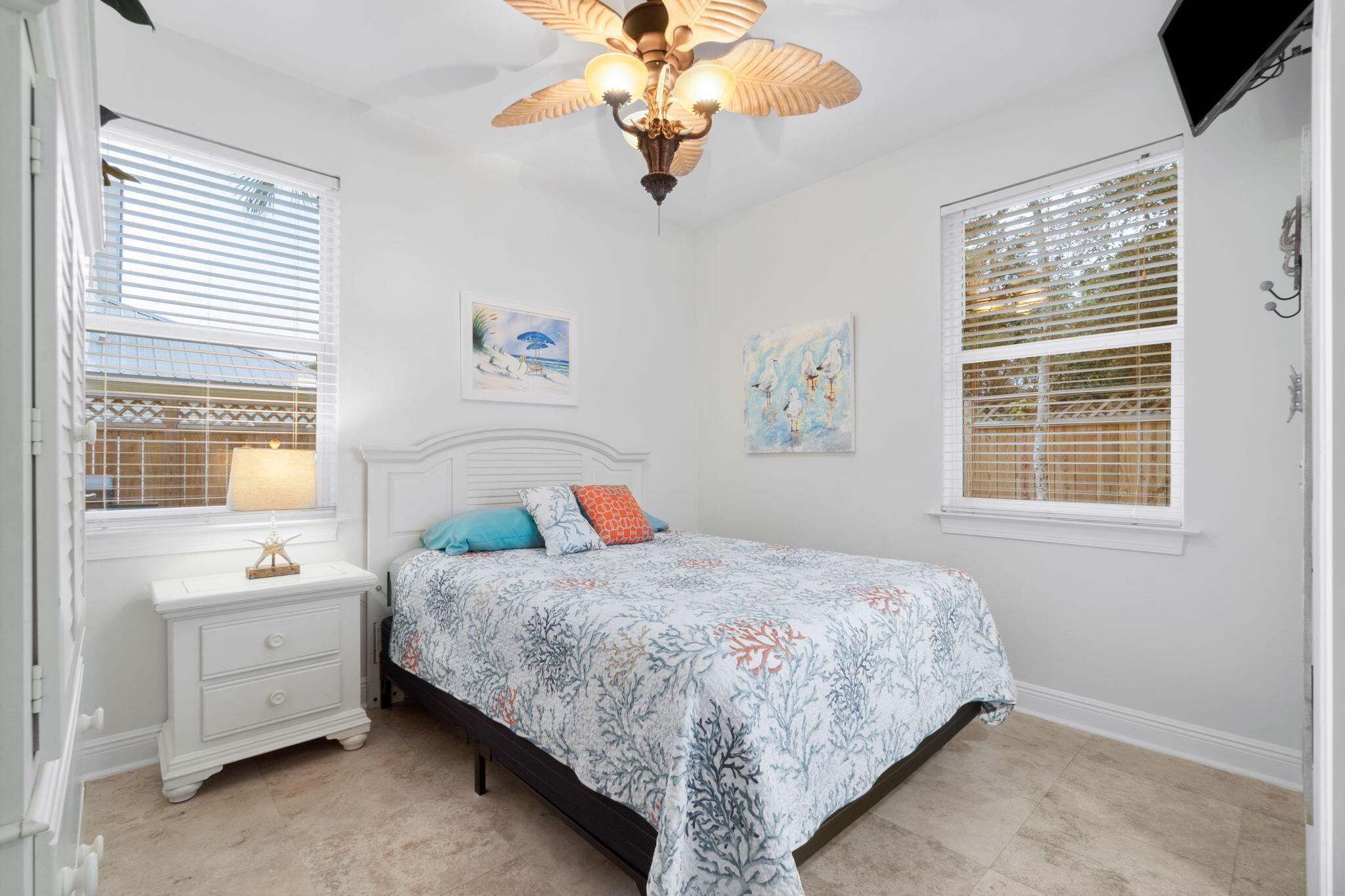 362 South Holiday Road Miramar Beach, FL 32550 - Photo 23 of 51 a bedroom with a bed and a chandelier