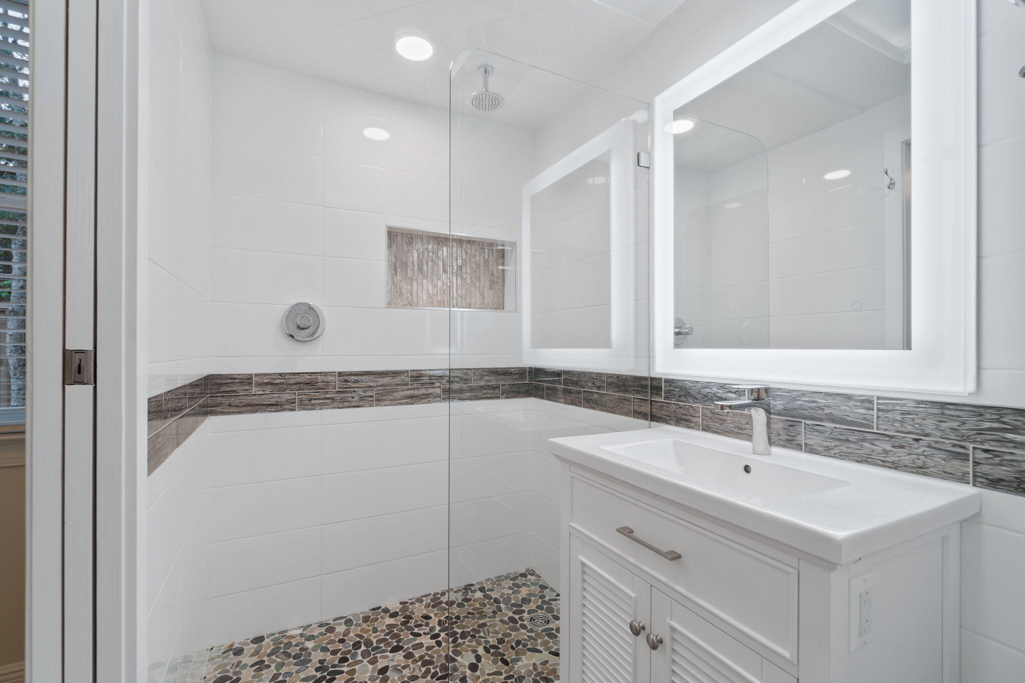 362 South Holiday Road Miramar Beach, FL 32550 - Photo 25 of 51 a bathroom with a sink mirror and a shower
