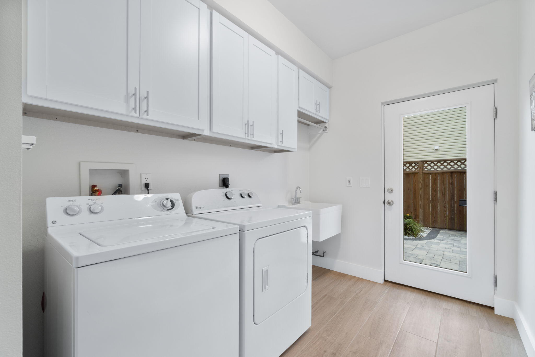 362 South Holiday Road Miramar Beach, FL 32550 - Photo 27 of 51 a utility room with dryer and washer
