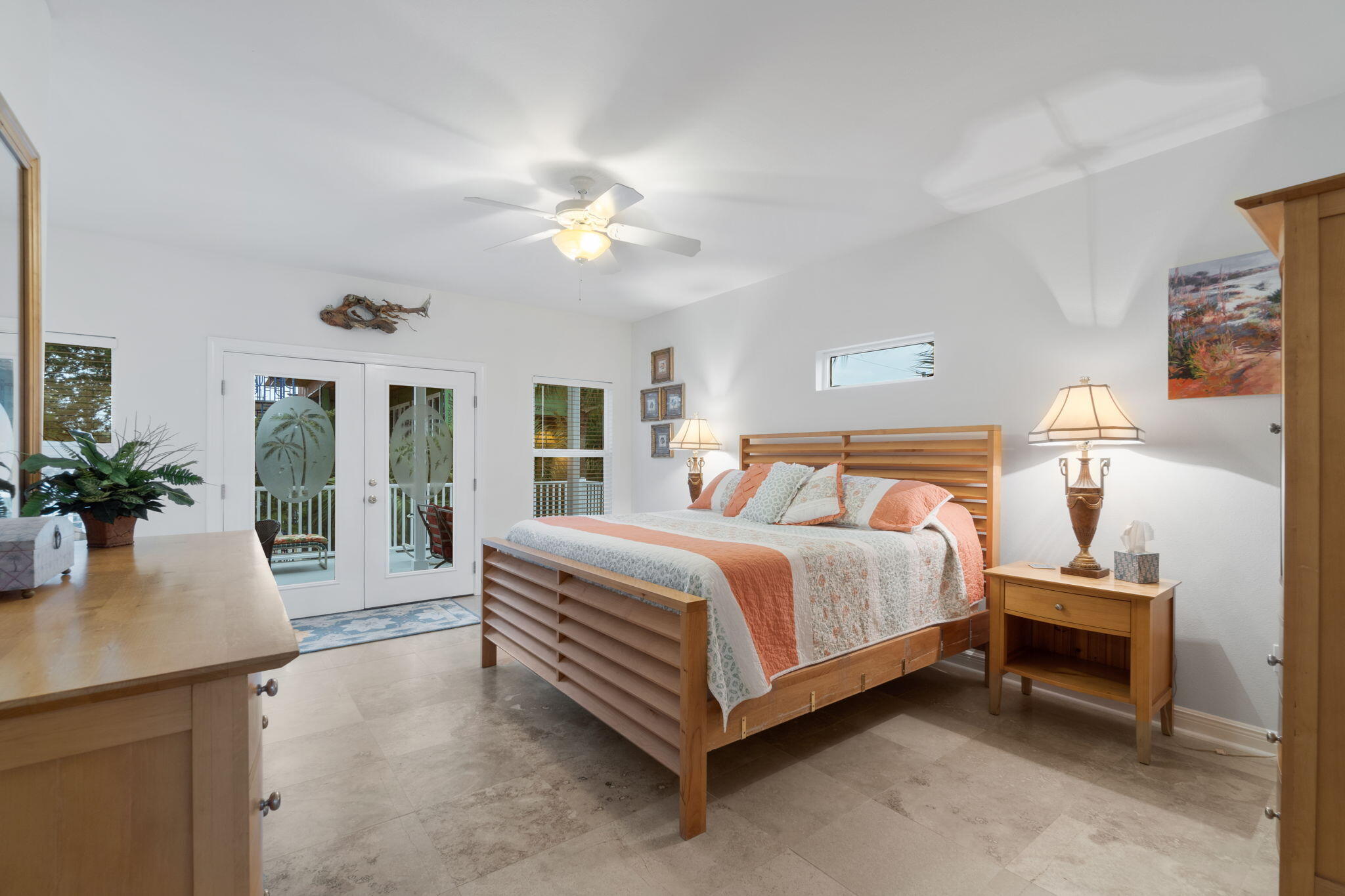 362 South Holiday Road Miramar Beach, FL 32550 - Photo 30 of 51 a spacious bedroom with a bed and a potted plant on the dresser