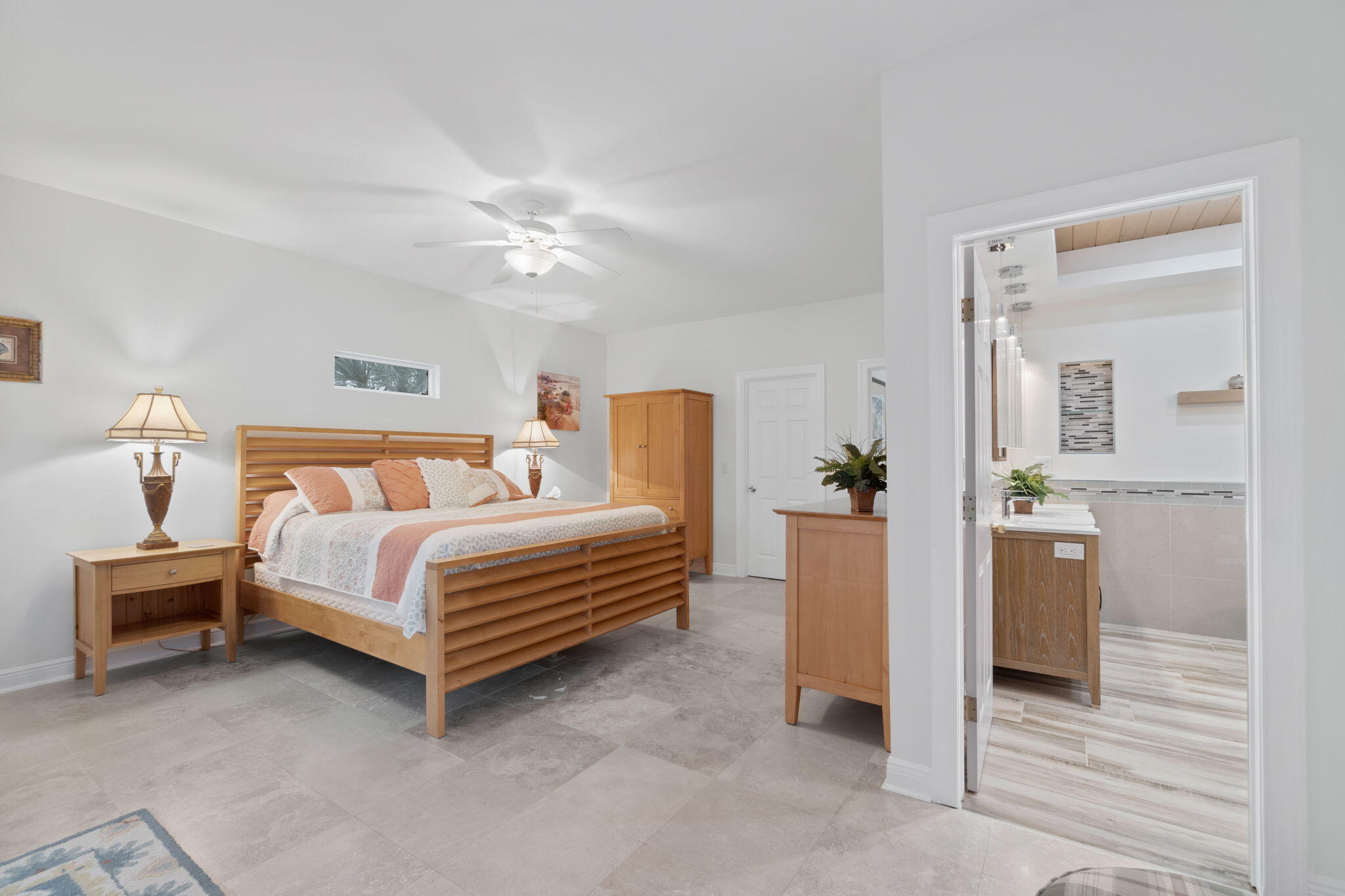 362 South Holiday Road Miramar Beach, FL 32550 - Photo 32 of 51 a bedroom with a bed and a chandelier