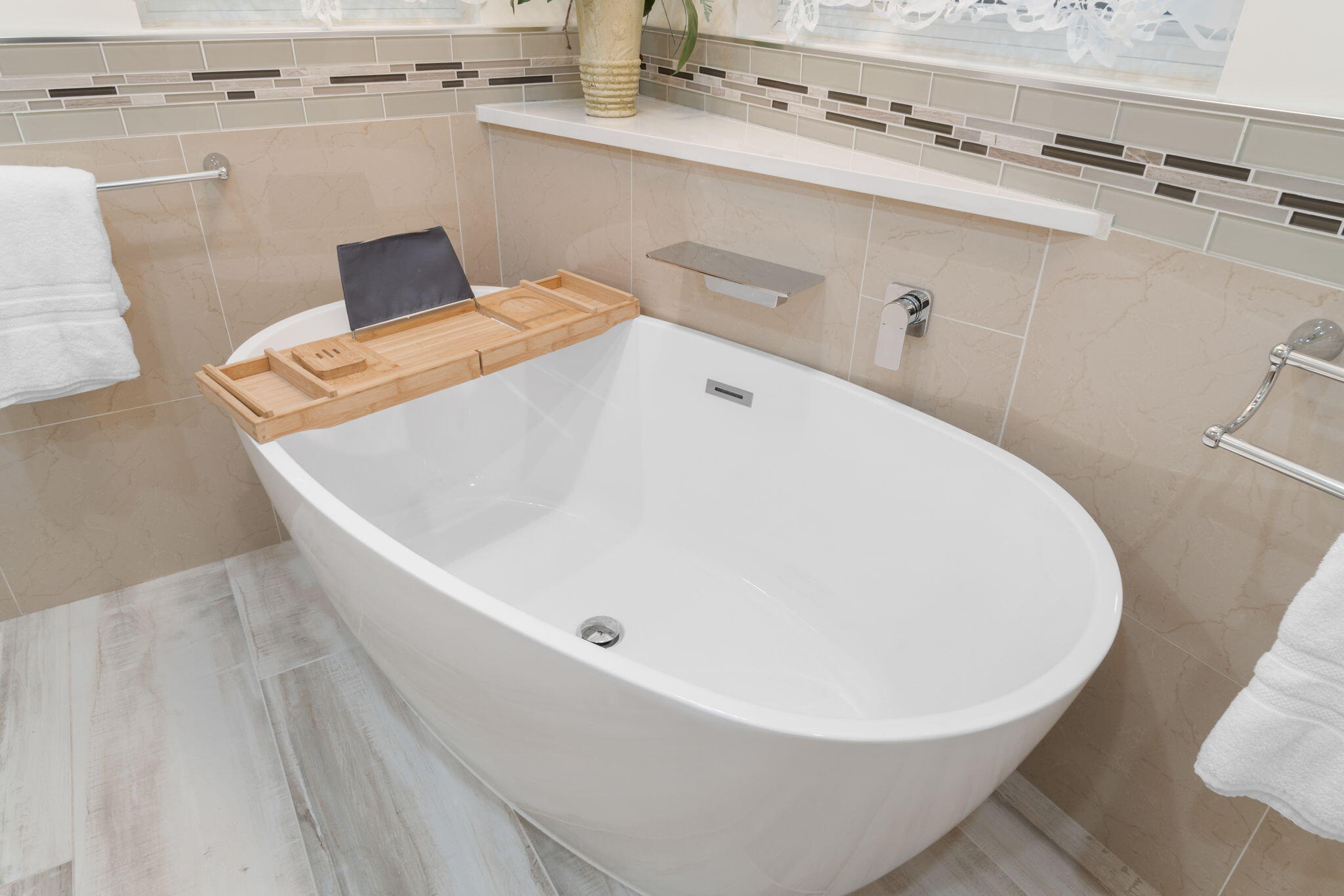 362 South Holiday Road Miramar Beach, FL 32550 - Photo 37 of 51 a white bath tub sitting next to a white sink and vanity