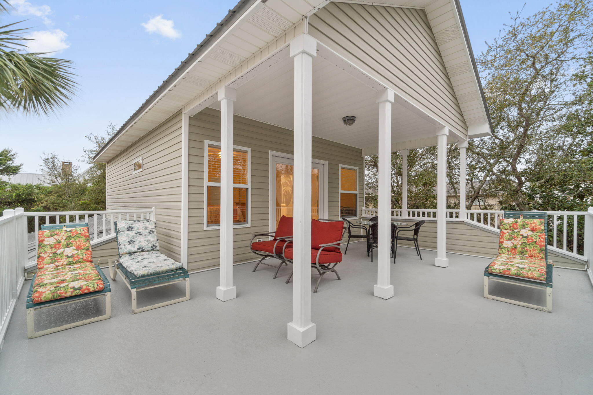 362 South Holiday Road Miramar Beach, FL 32550 - Photo 39 of 51 a view of a patio with chairs and potted plants