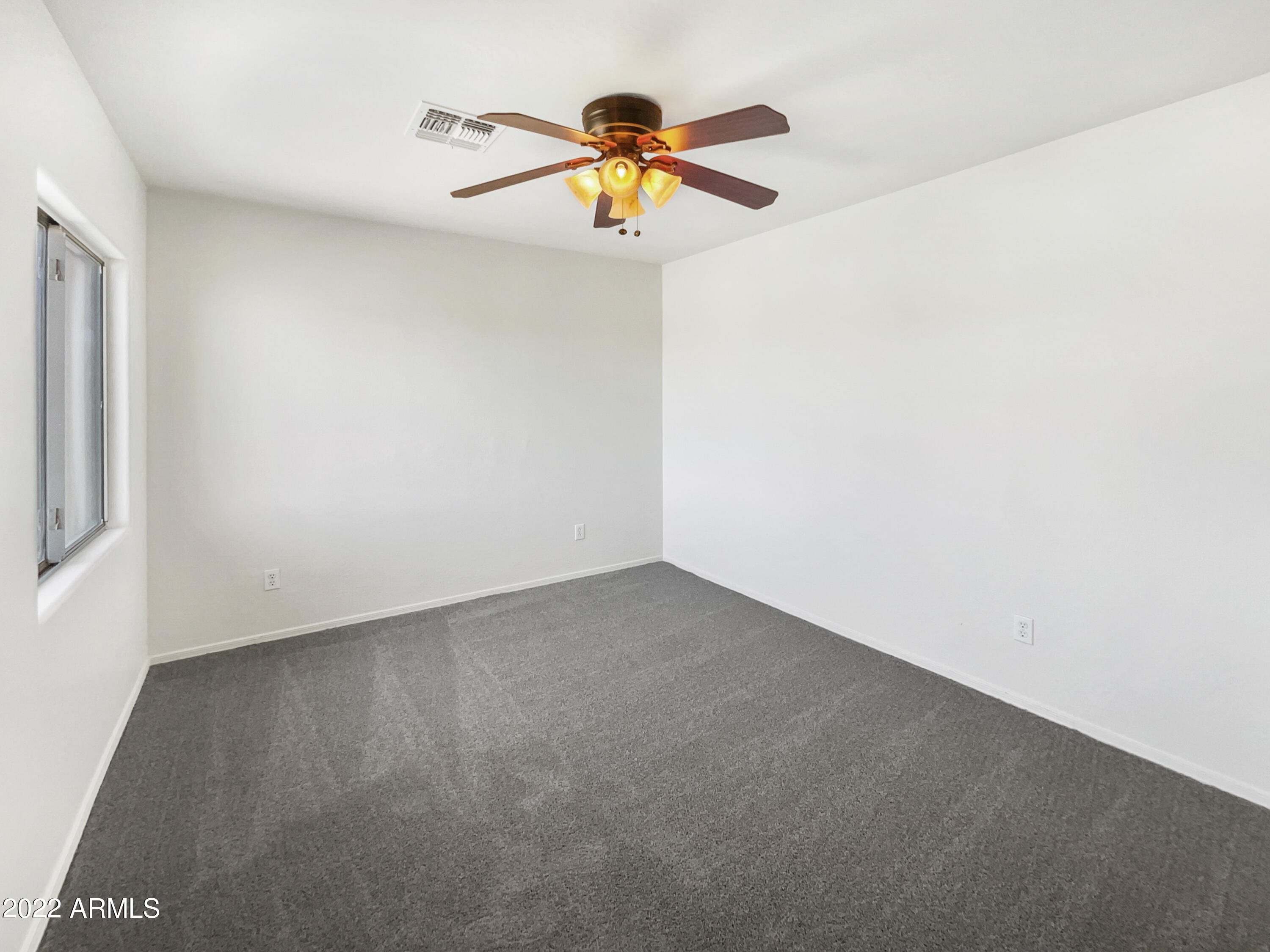 44011 West Cowpath Road Maricopa, AZ 85138 - Photo 15 of 18 a view of empty room