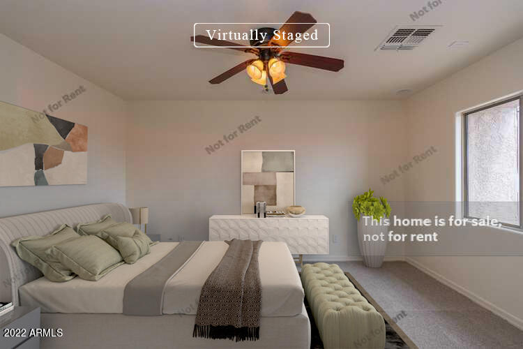 44011 West Cowpath Road Maricopa, AZ 85138 - Photo 3 of 18 a bedroom with a bed and window