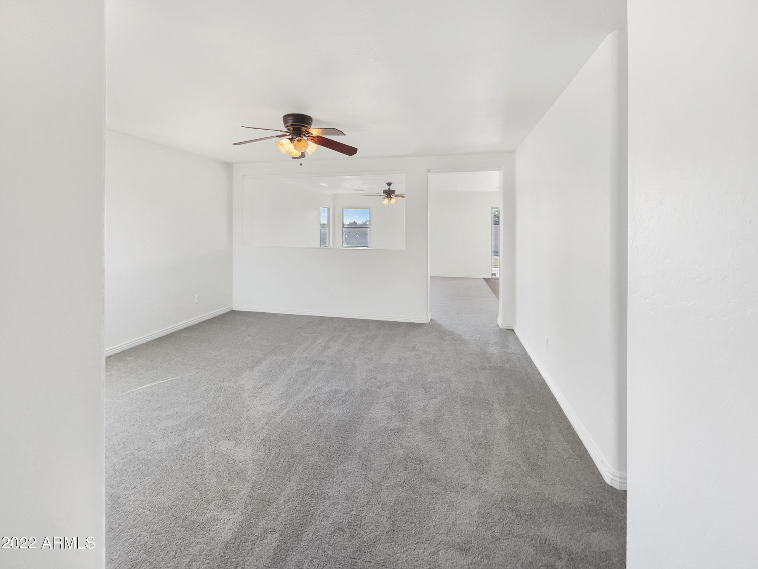 44011 West Cowpath Road Maricopa, AZ 85138 - Photo 5 of 18 a view of a room with a refrigerator