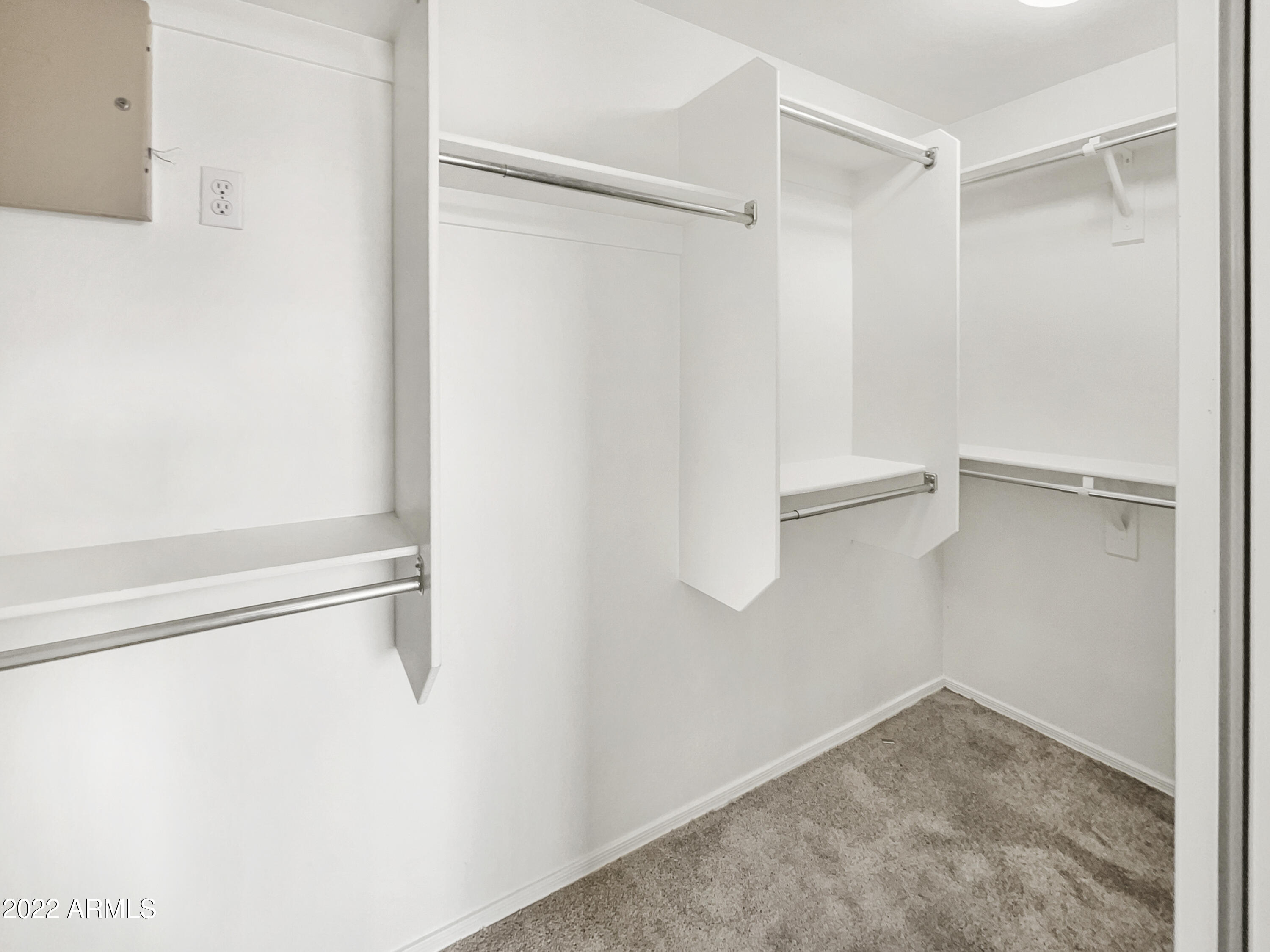 44011 West Cowpath Road Maricopa, AZ 85138 - Photo 9 of 18 a view of an empty walk in closet