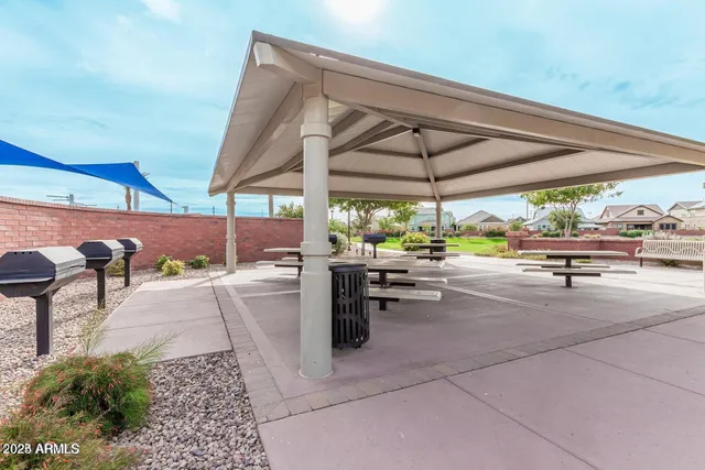 a view of a terrace with furniture and a table